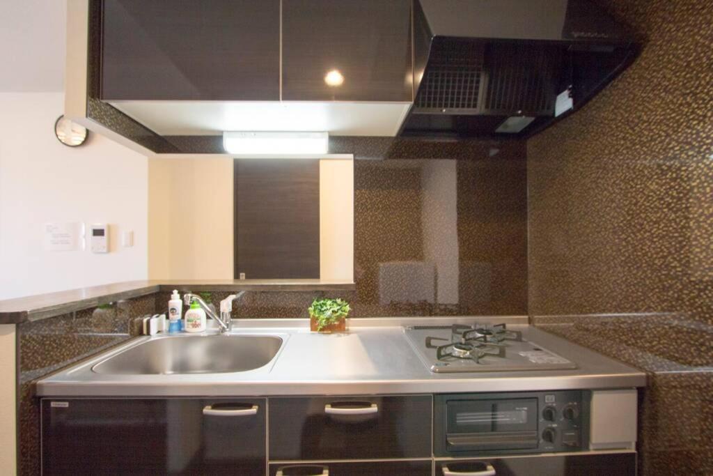 Apartament ようこそ札幌へ! 大通公園まで地下鉄10分 定員6名 Firetv完備 1階はセコマ Zewnętrze zdjęcie