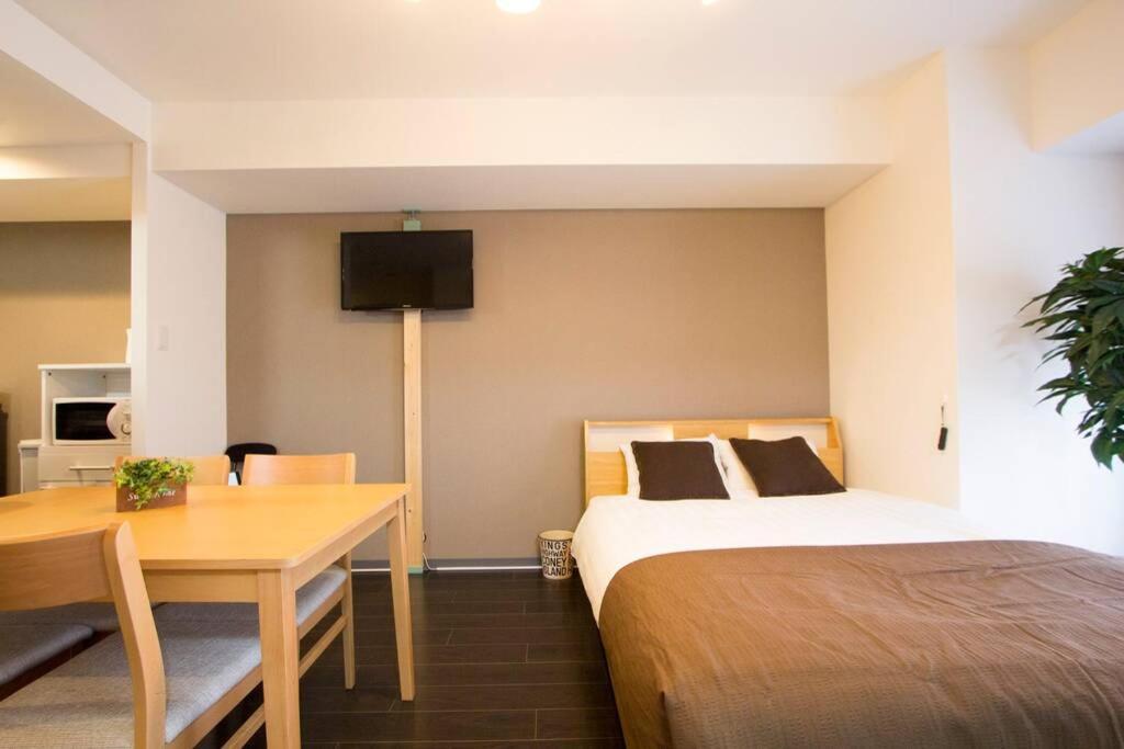 Apartament ようこそ札幌へ! 大通公園まで地下鉄10分 定員6名 Firetv完備 1階はセコマ Zewnętrze zdjęcie